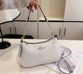 Cartera coach de diseñador